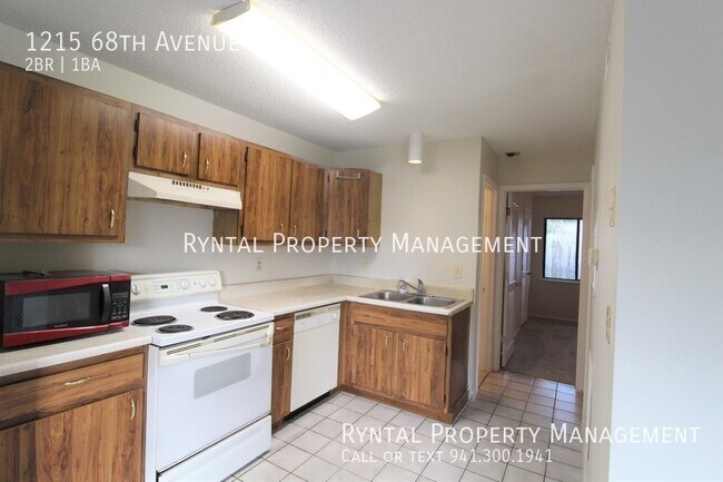 Building Photo - 1215 68th Avenue Dr W