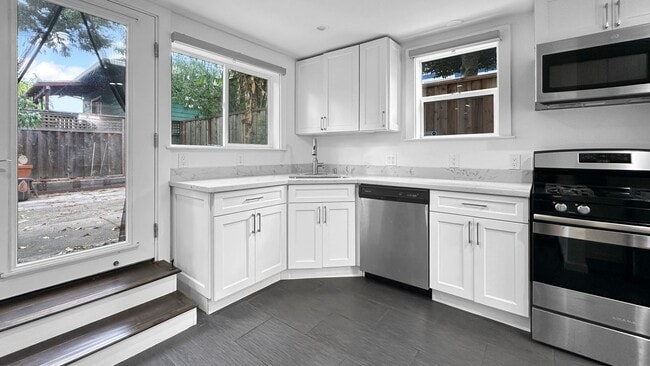 Building Photo - Private Gated Studio with Shared Backyard ...