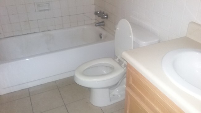 Full bath upstairs, 1/2 Downstairs - 1010 N Toombs St