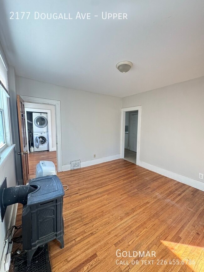 Building Photo - Cozy Upper Unit Now Available!!