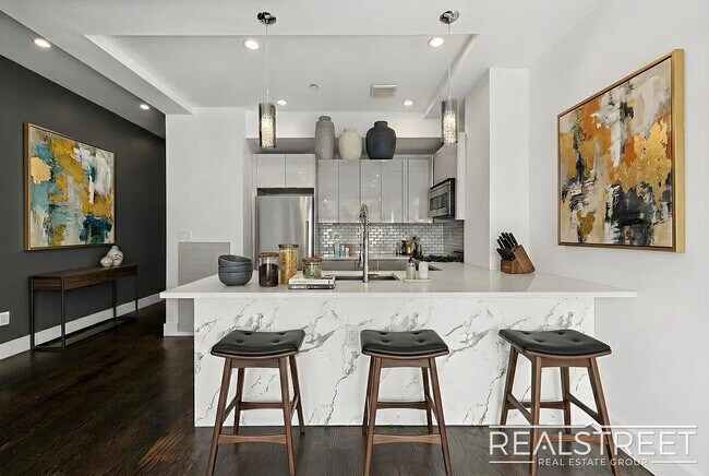 Building Photo - Modern Bushwick 2-bedroom, 2.5-bath duplex with private garden, deck, and finished recreation room —