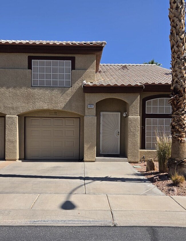 Building Photo - Two story 2 bedroom townhome with newer flooring, paint & appliances - community pool!