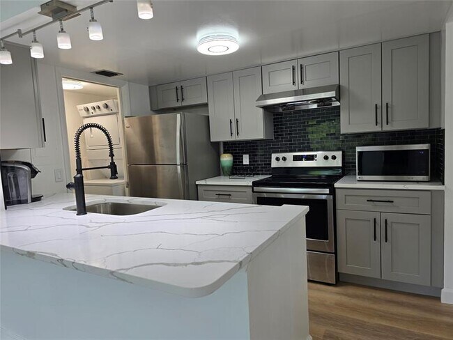 Foto del edificio - 1000 River Reach Dr