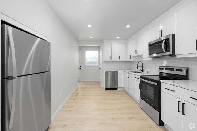 4BR - 2.5BA - Kitchen - 3408-3412 Northwest, 3 Beds, 2.5 Bath & 4 Beds, 2.5 Bath Units Available!