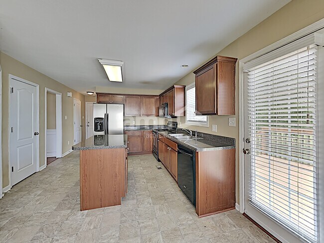 Foto del edificio - 5112 Horsestall Dr