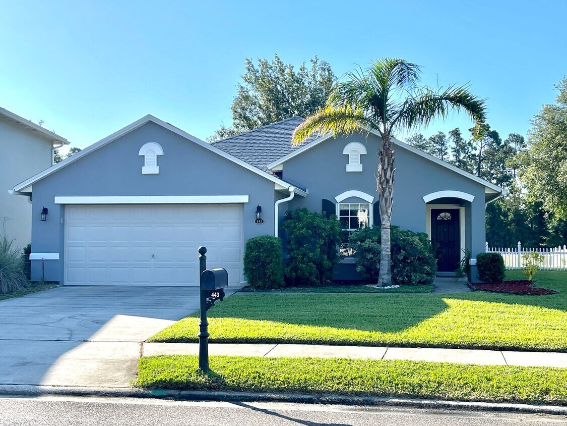 Primary Photo - Lovely home is located on the edge of a be...
