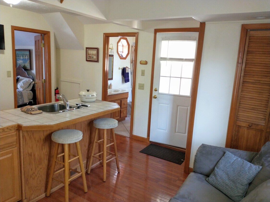 View of front door entrance, Living area, kitchen, bath, bedroom - 1906 NW Catawba Rd