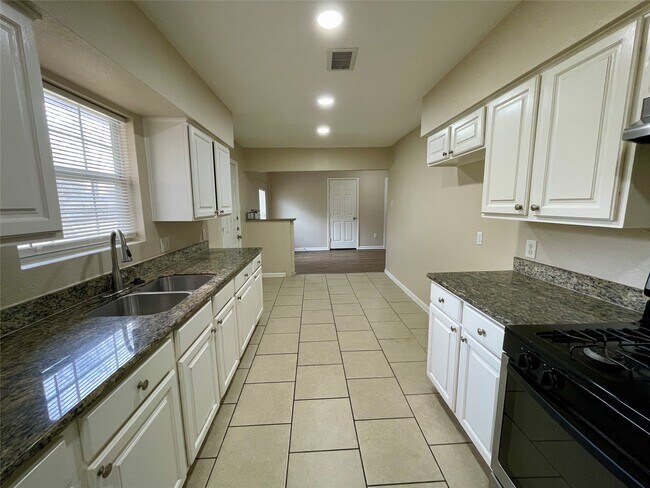 Building Photo - 6144 Doulton Dr