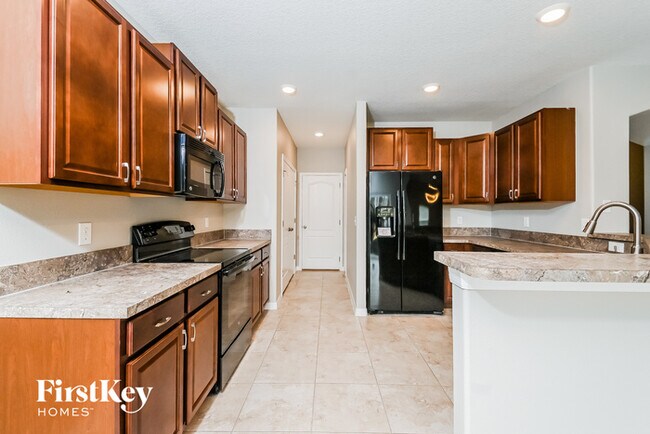 Building Photo - 4972 Reflecting Pond Cir