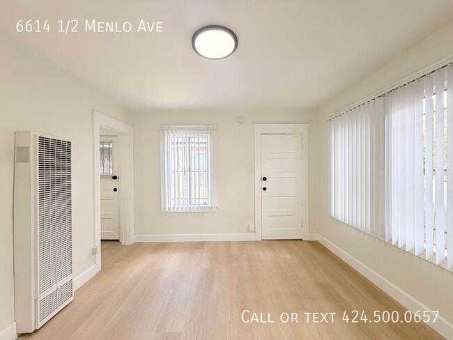 Building Photo - 6614 1/2 Menlo Ave-