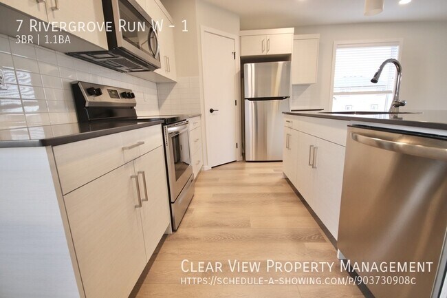 Photo du bâtiment - Beautiful 3 bedroom townhouse in Riverstone!