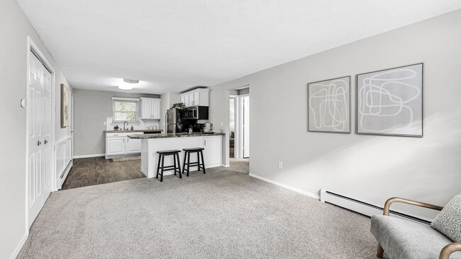 Your Ideal Space Awaits in Our Expansive and Welcoming Living Rooms. - Edgewood Court