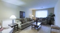Located at 4881 Kingshill Dr in Columbus, Ohio, this single-floor residence offers a well-designed layout that balances comfort and functionality. The living room serves as the heart of the home, featuring a generously sized layout that accommodates multiple seating arrangements with ease. A large window allows abundant natural light to fill the space, creating a bright and airy atmosphere throughout the day. The room's light-toned walls and neutral flooring provide a clean, versatile backdrop that complements a wide range of décor styles. A textured ceiling adds a subtle architectural detail, while the open flow of the space enhances its overall sense of roominess. The living area is well-suited for both relaxed everyday living and casual entertaining, with enough space to comfortably host guests. The single-floor layout ensures convenient, step-free accessibility throughout the entire home, making it practical for a variety of lifestyles. Overall, this Columbus residence offers a straightforward, inviting atmosphere with functional living spaces and solid natural light, making it a comfortable place to call home.