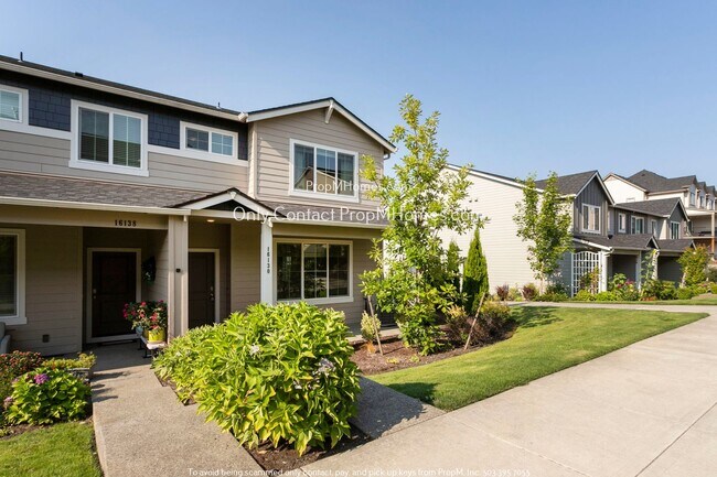 Building Photo - End-Unit Elegance: Charming Townhome in Vi...