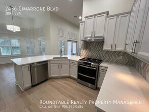 Building Photo - 2436 Cimarrone Blvd
