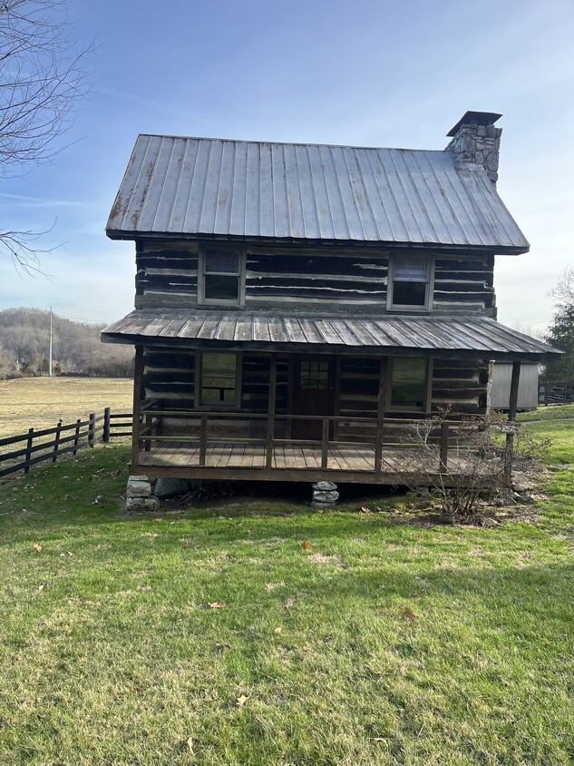 200 year old log cabin - 704 E Mountain View Rd