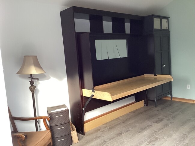 Murphy double bed closes to this work bench/ you buy mattress. - 2519 Rheem Ave