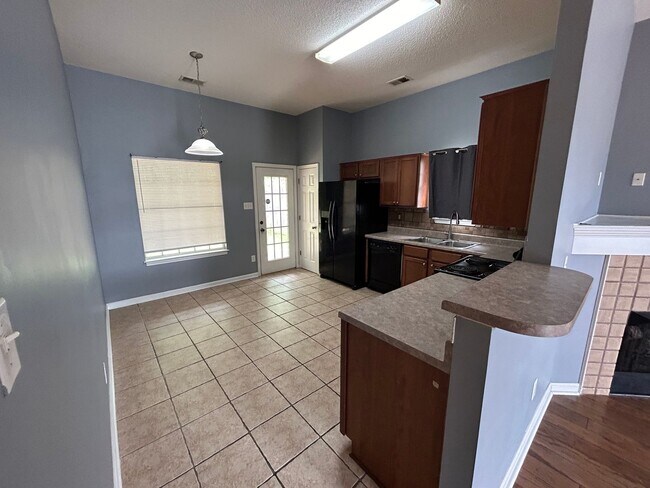 Building Photo - 6836 Kamali Ave