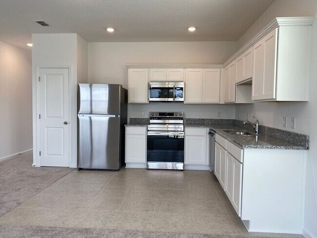 Foto del edificio - 5913 Piney Shrub Pl