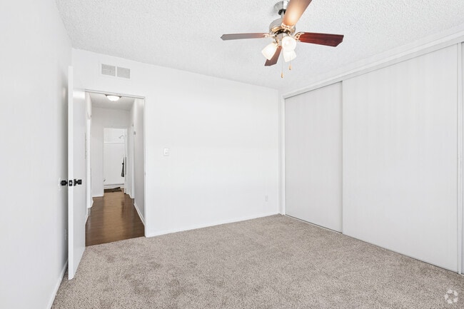 2BR, 2BA - 945SF - Primary Bedroom - Prospect Plaza Apartments