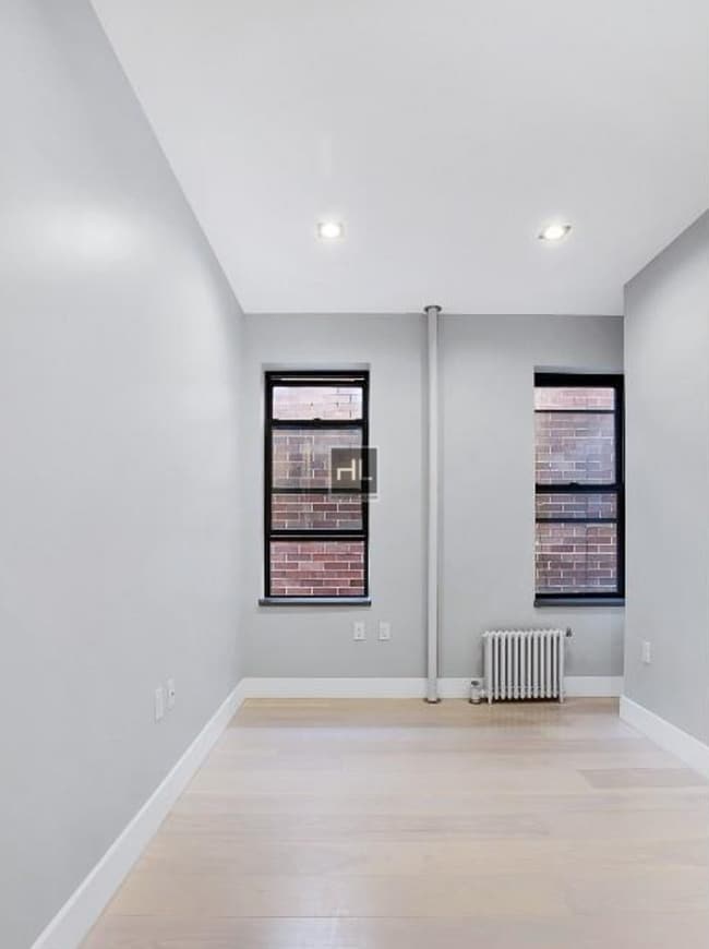 Building Photo - Renovated Lower East Side 1-Bedroom with M...