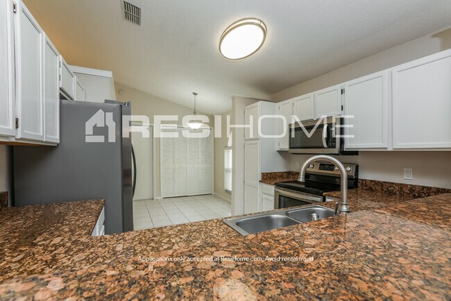 Building Photo - 1359 Woodfield Oaks Dr