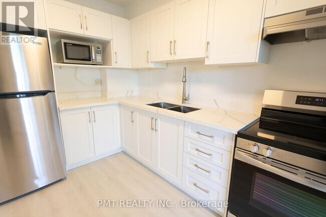 Building Photo - 1455 Lawrence Ave W