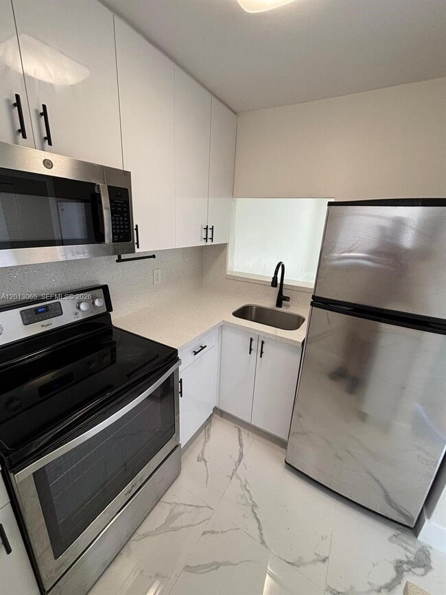 Building Photo - 4298 NW S Tamiami Canal Dr
