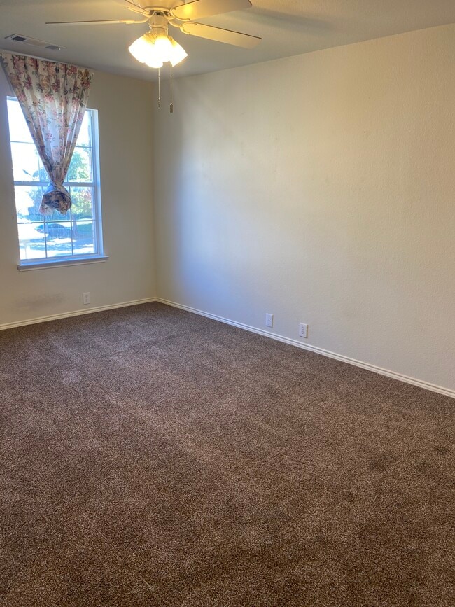 The second bedroom features brand new carpet. - 2725 Hyde Park Dr