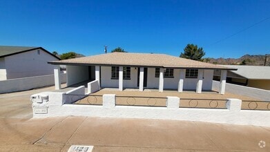 Building Photo - 1128 E Orchid Ln
