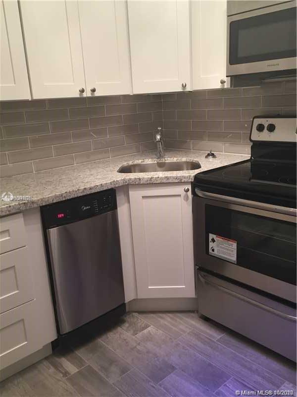 Building Photo - 3075 NW 7th St