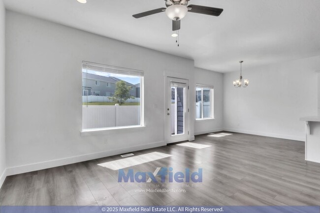 Building Photo - Spacious 5-Bedroom End-Unit Townhome with ...