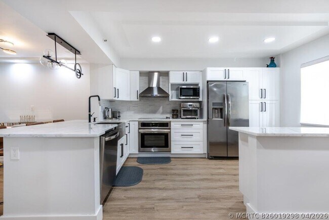 Foto del edificio - 6096 Huntwick Terrace