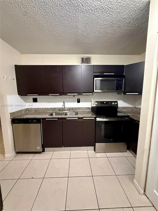 Building Photo - 11225 Royal Palm Blvd
