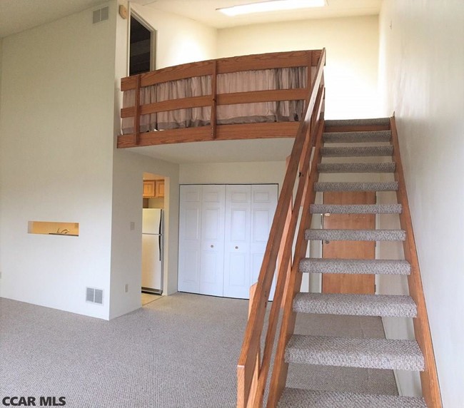 Stairs to loft - 800 Stratford Dr