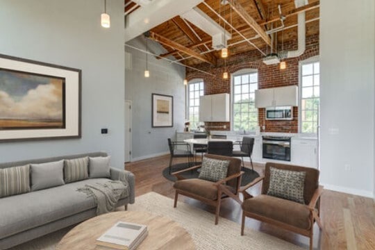 Spacious Living Room with vaulted ceilings - Mill Street Square