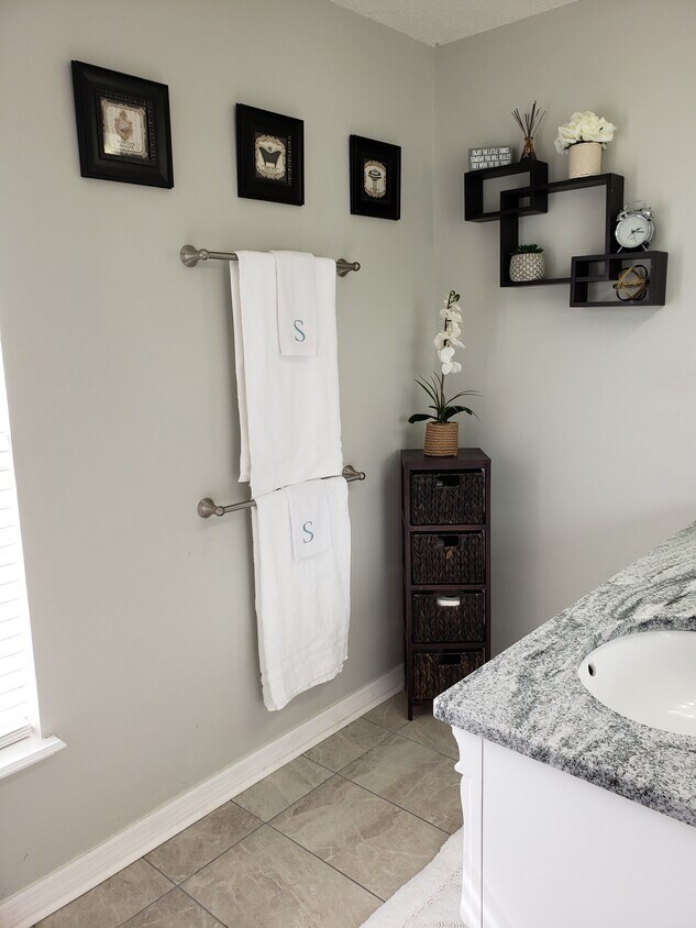 Master bathroom with tub and shower. - 76550 Longleaf Loop