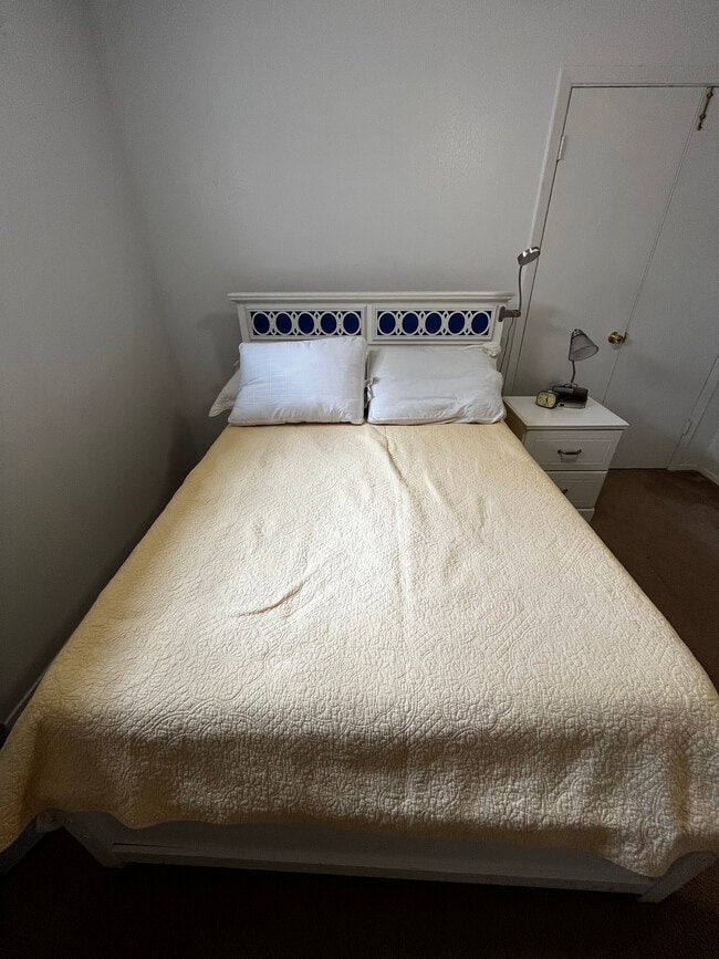 Bed and nightstand - 13632 Garden Grove Ct