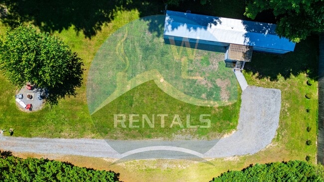 Photo - Charming 3-bedroom, 2-bath single wide trailer in Whittier, NC available now for year-long lease. House