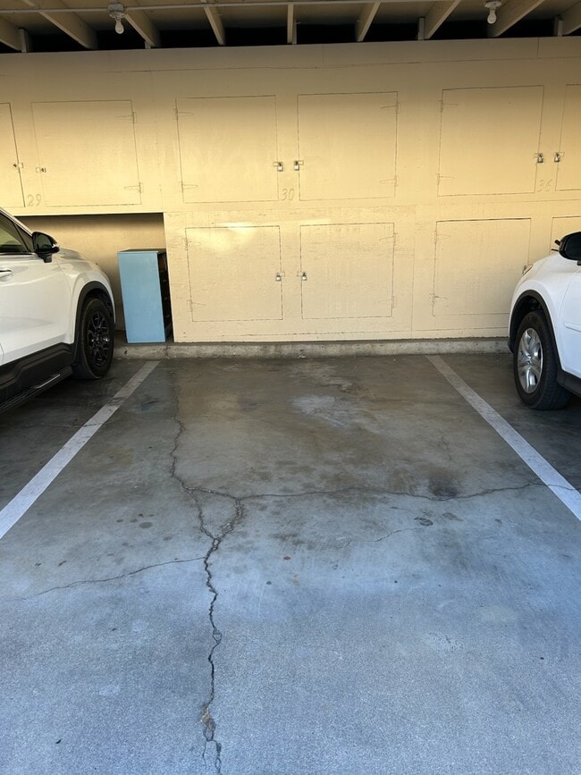 covered parking space with storage cupboards - 138 S Bryn Mawr St