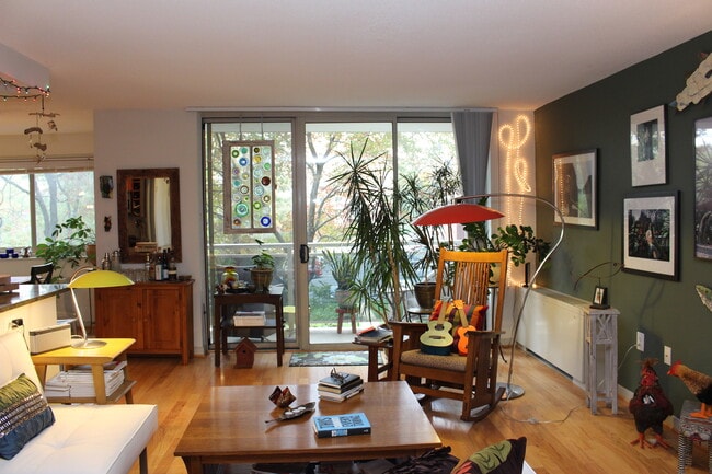 Living room & balcony at tree level - 7333 New Hampshire Ave