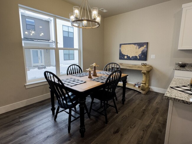 Building Photo - Refined 3-Bedroom Townhome in Sugar City | Spacious Layout, 2-Car Garage & Modern Finishes