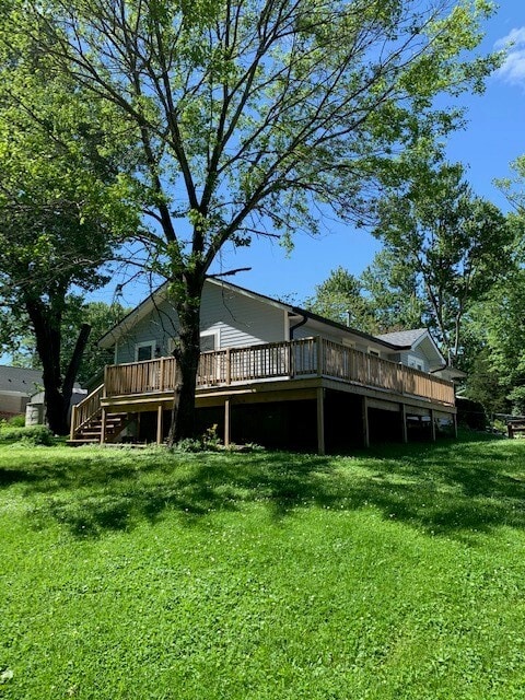 Rear view with wrap around deck to the kitchen - 607 W Duncan Dr