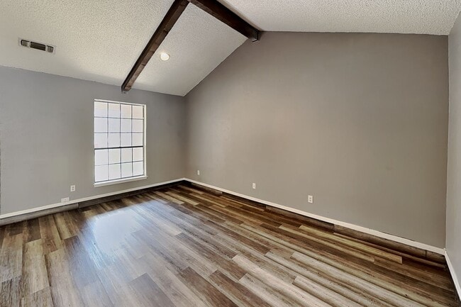 Building Photo - Darling Fort Worth Duplex! Vaulted Ceilings, Wood Beams & Covered Outdoor Living!
