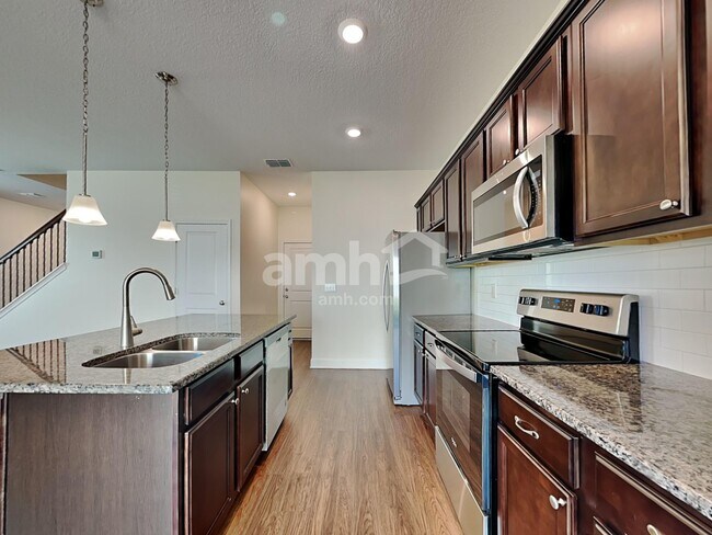 Foto del edificio - 11208 Delicate Rose Ct