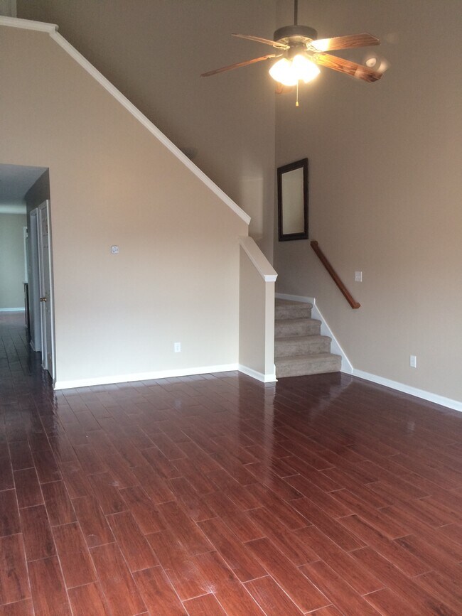 Living room (stairs to two bedrooms) - 178 Kelly Cir