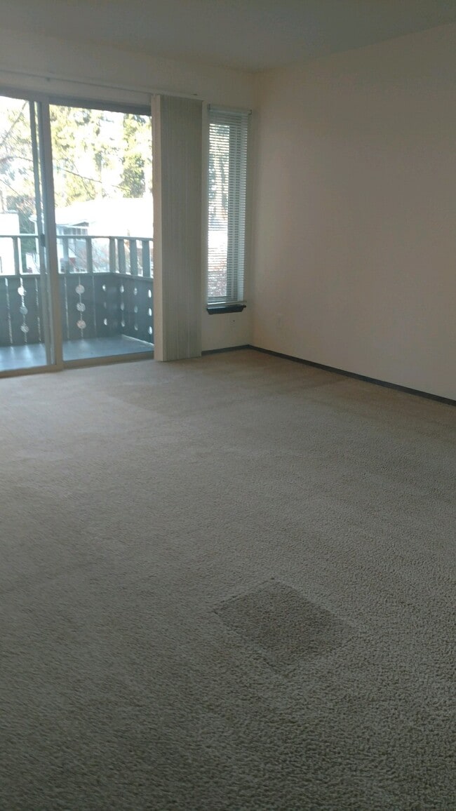 Living room sliding deck doors - Legend House