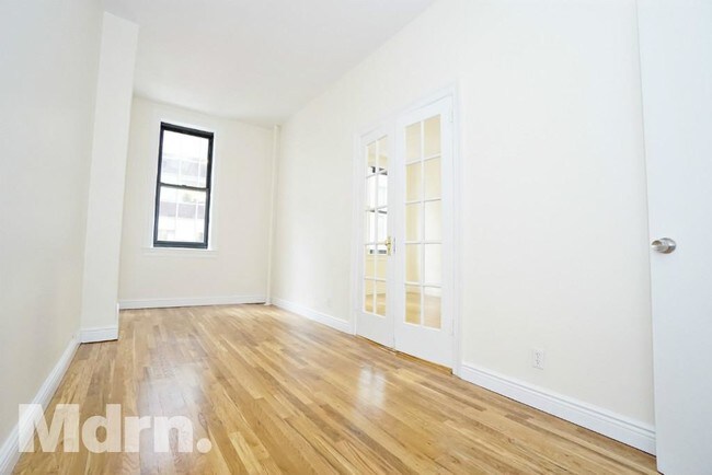 Building Photo - 44 W 56th St