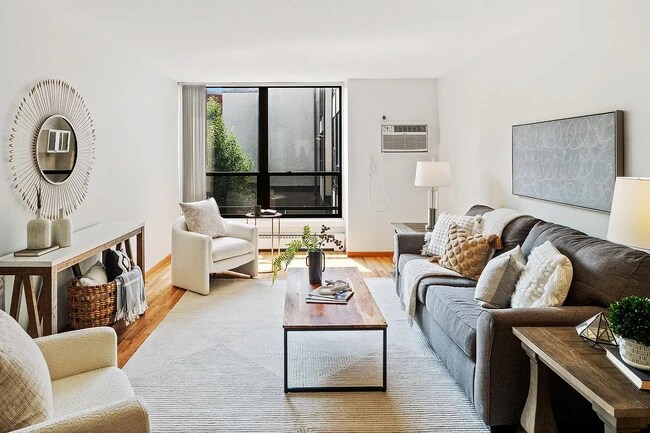 Living room, new AC - 4530 Park Commons Dr