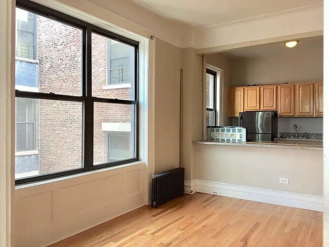 Building Photo - "Charming 1-Bedroom Retreat in Vibrant New York Locale – Your Perfect Urban Sanctuary!"